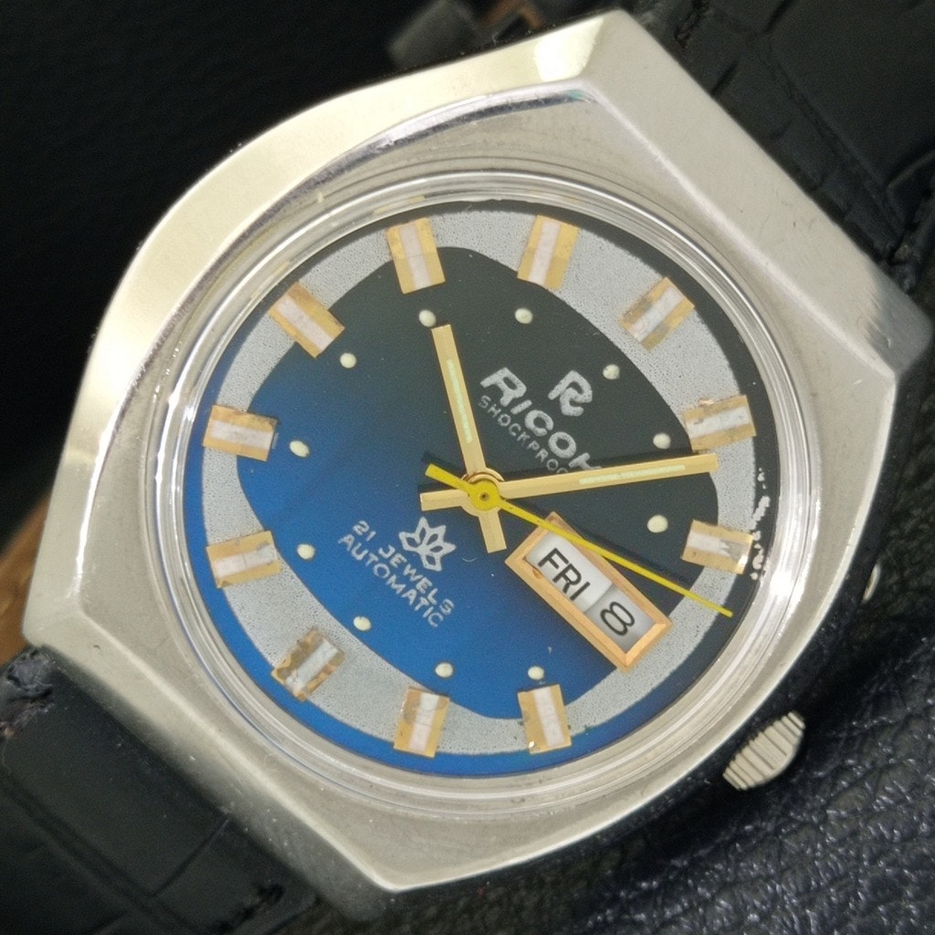 Vintage 1972 Ricoh Automatic Mens Silver Watch WDaydate  Blue Accents